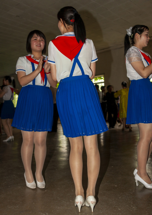 North Korean pioneer girls dancing in a school, DGC, Pyongyang, North Korea