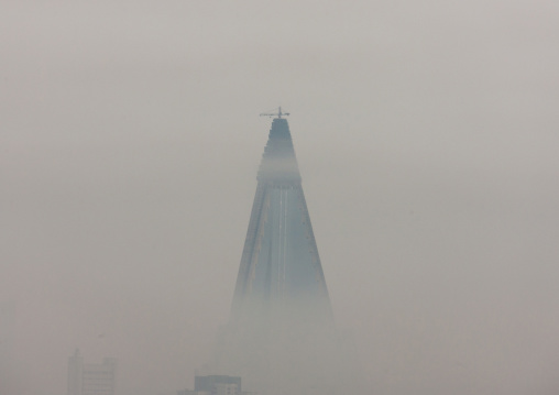 The pyramid-shaped Ryugyong hotel in the fog, DGC, Pyongyang, North Korea
