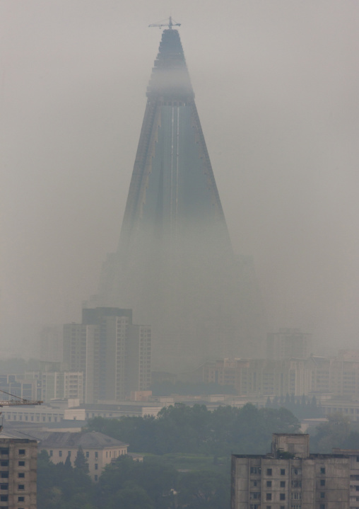 The pyramid-shaped Ryugyong hotel in the fog, DGC, Pyongyang, North Korea
