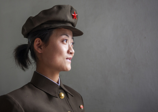 Portrait of a North Korean woman soldier with a cap, DGC, Pyongyang, North Korea