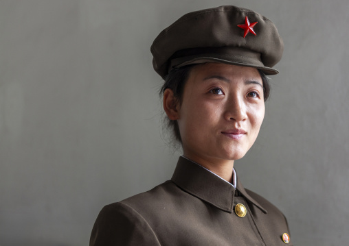 Portrait of a North Korean woman soldier with a cap, DGC, Pyongyang, North Korea