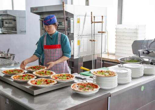 North Korean pizzeria cooks in an italian restaurant, DGC, Pyongyang, North Korea