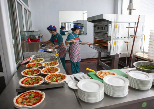 North Korean pizzeria cooks in an italian restaurant, DGC, Pyongyang, North Korea