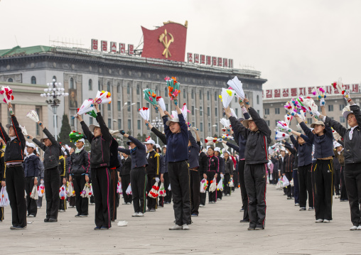 Young women during a mass games rehearsal in Kim il Sung square, DGC, Pyongyang, North Korea