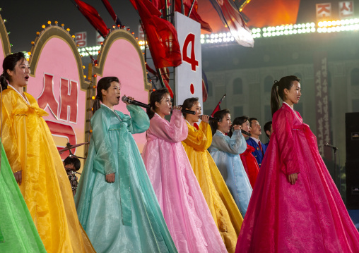 North Korean artists singing during a mass dance on Kim il Sung square, DGC, Pyongyang, North Korea