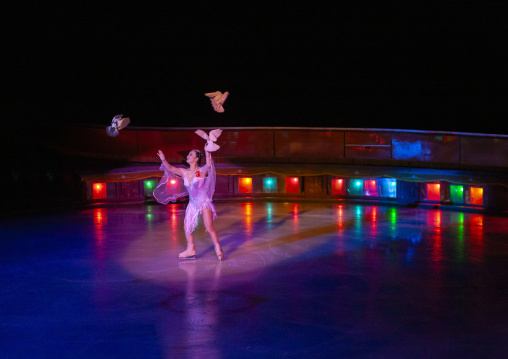 Dancer in pink ice skating in the circus, DGC, Pyongyang, North Korea
