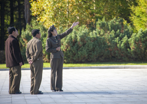 North Korean guide with visitors in the Grand monument of lake Samji, Ryanggang, Samjiyon, North Korea