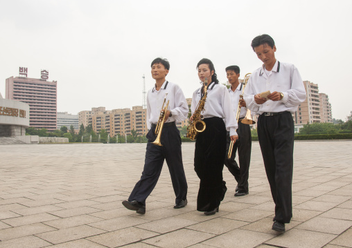 State artists on national day in front of the monument to the founding of the Party, DGC, Pyongyang, North Korea