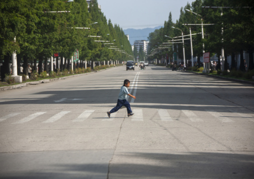 North Korean boy on pedestrian crossing, Kangwon Province, Wonsan, North Korea