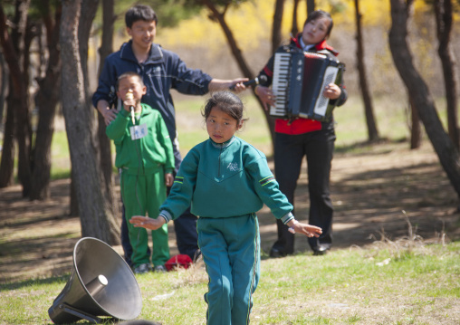 North Korean girl dancing in a summer camp, North Hamgyong, Chilbo Sea, North Korea