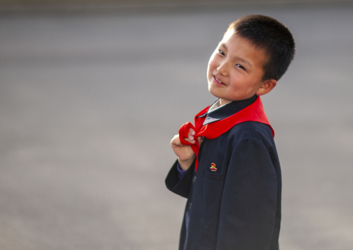 North Korean pioneer boy in the street, DGC, Pyongyang, North Korea