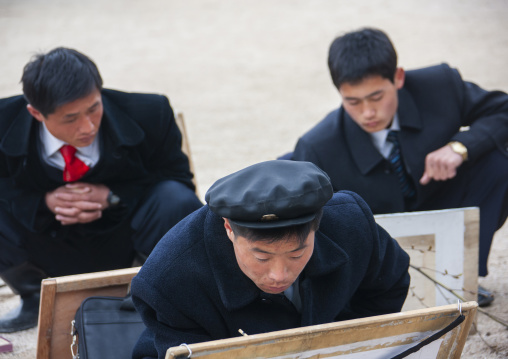 North Korean art students painting in the street, North Hwanghae, Kaesong, North Korea