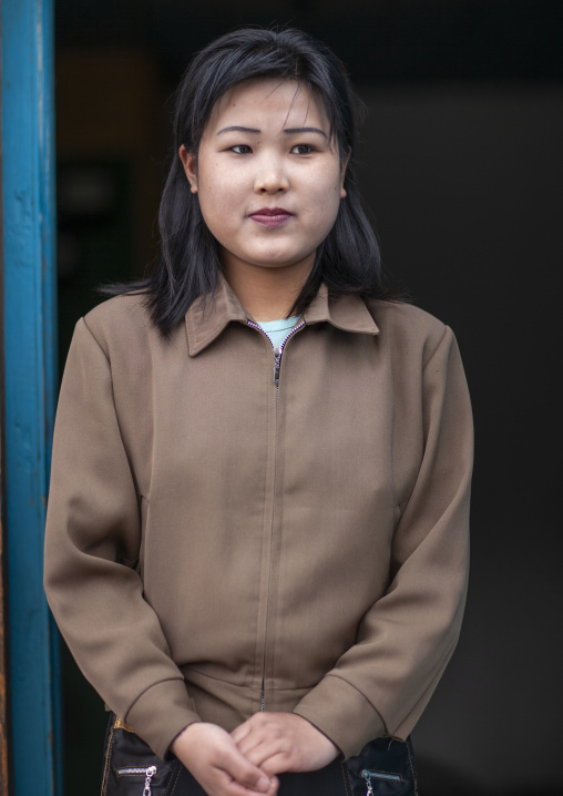 North Korean woman working on Rimyonsu dam, Ryanggang, Rimyongsu, North Korea