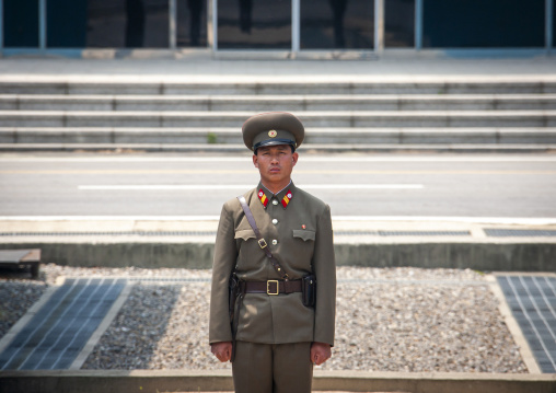 North Korean soldier standing on the demarcation line in the DMZ, North Hwanghae, Panmunjom, North Korea