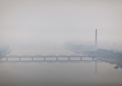 Juche tower on Taedong river in the fog, DGC, Pyongyang, North Korea