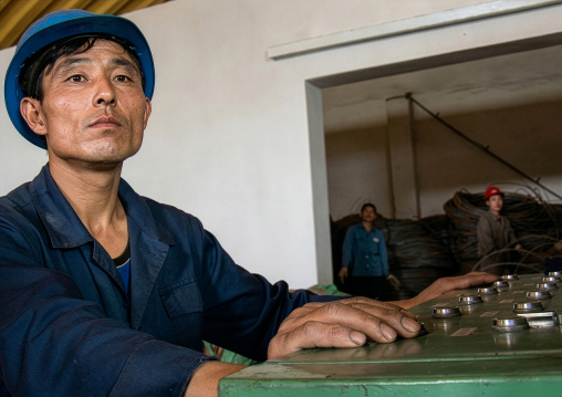 North Korean worker in a steel factory, South Pyongan Province, Nampo, North Korea
