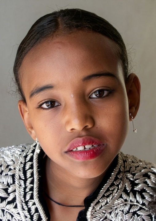 Portrait of an ethiopian girl dressed for a wedding, Amhara Region, Lalibela, Ethiopia