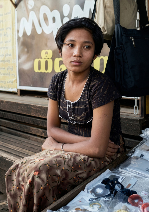Young burmese woman with thanaka on her face, Yangon region, Yangon, Myanmar