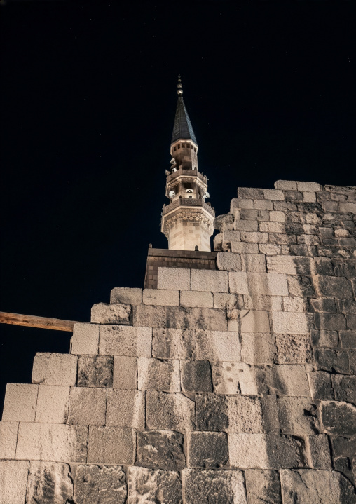 Minaret of Umayyad Mosque illuminated at night, Rif Dimashq, Damascus, Syria