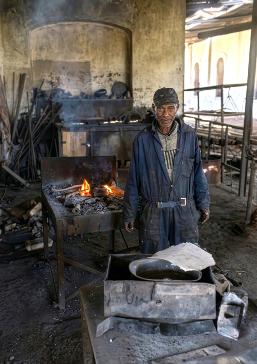 Old man in the train station workshop, Central Region, Asmara, Eritrea