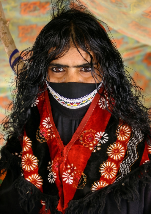 Portrait of a veiled Rashaida tribe woman with long hair, Northern Red Sea, Massawa, Eritrea