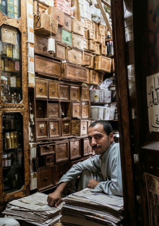 Herborist man in his pharmacology shop, Amanat Al-Asemah, Sanaa, Yemen