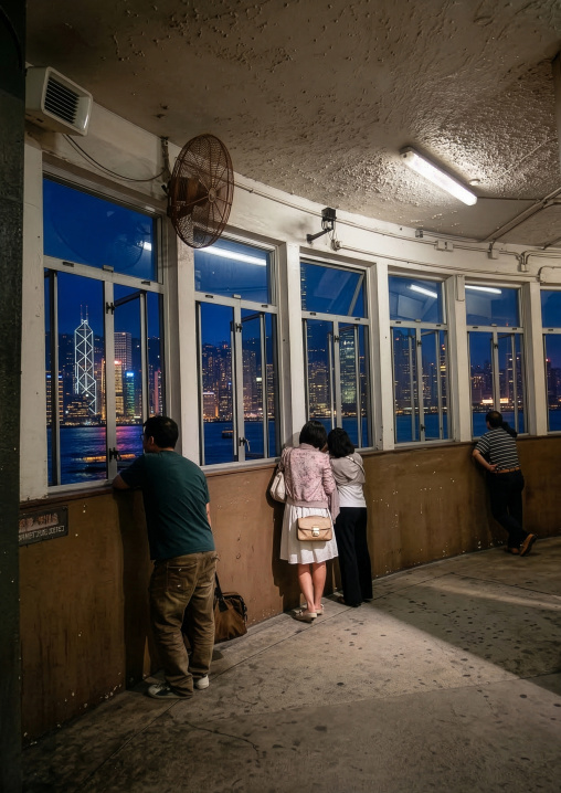 Passengers waiting to board ferry, Special Administrative Region of the PRC, Hong Kong, China