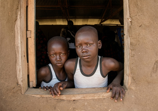 Mundari tribe boys at the window of a church, Central Equatoria, Terekeka, South Sudan
