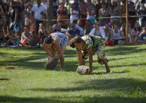 Stone competition at anakena beach during tapati festival, Easter Island, Hanga Roa, Chile