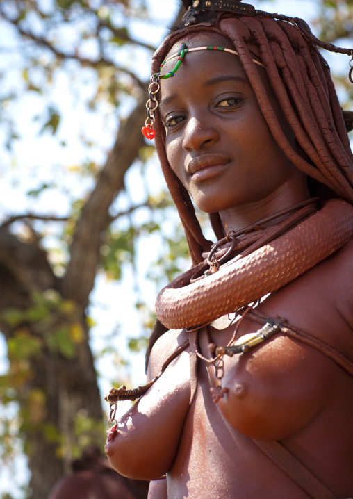 Himba Woman Called Mucaniama Wearing A  Plastic Jewel, Village Of Hoba Haru, Angola