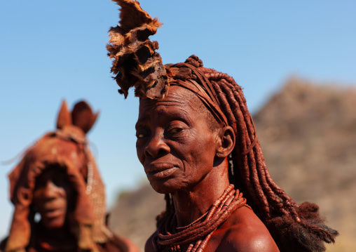 Himba tribe women covered with otjize, Cunene Province, Oncocua, Angola