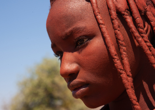 Portrait of a Himba tribe woman covered with otjize, Cunene Province, Oncocua, Angola