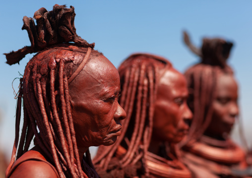 Himba tribe women covered with otjize, Cunene Province, Oncocua, Angola