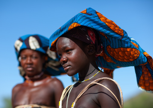 Portrait of a Mucubal tribe women wearing colorful headwears, Namibe Province, Virei, Angola