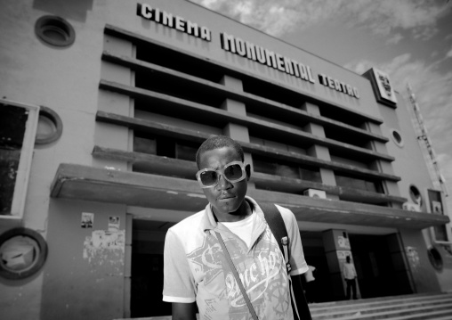 Young Fashionable Man In Front Of Benguela Art Deco Cinema Theater, Angola