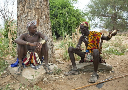 Mucubal Men Chatting At The Bottom Of A Tree, Virie Area, Angola