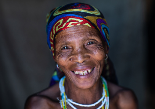 San tribe woman smiling portrait, Huila Province, Chibia, Angola
