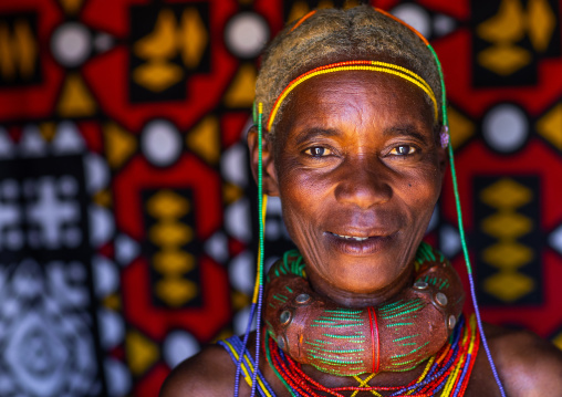 Mungambue tribe woman with the traditional hairtsyle and necklace, Huila Province, Chibia, Angola