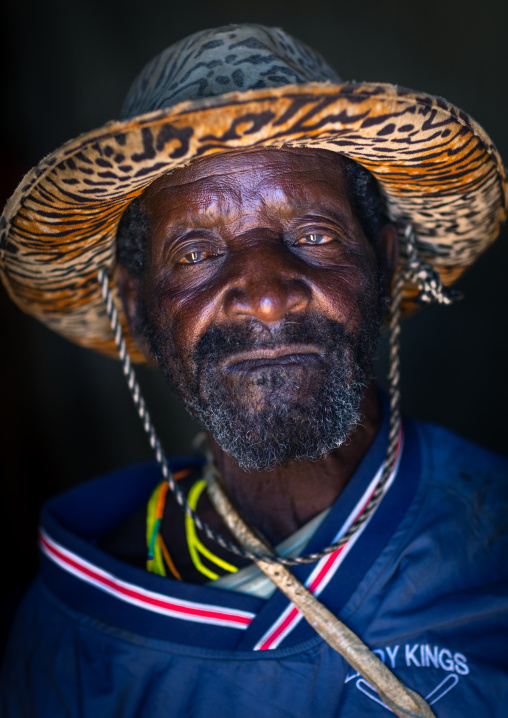 Mungambue tribe man wearing a hat, Huila Province, Chibia, Angola