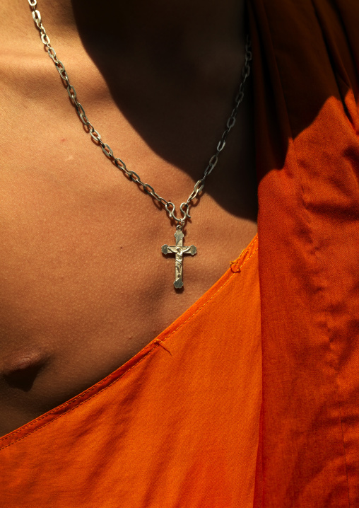 Monk With A Christina Cross Around His Neck, Menglun, Yunnan Province, China