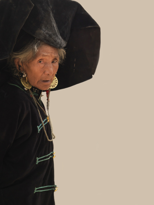 Yi Tribal Woman In Traditional Clothes, Yongsheng, Yunnan Province, China