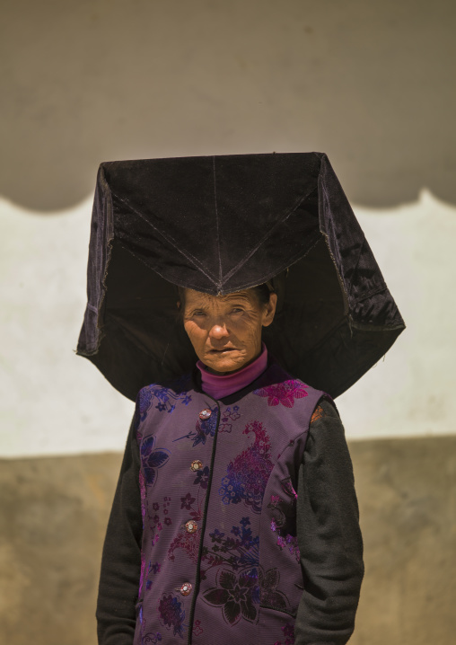Yi Tribal Woman In Traditional Clothes, Yongsheng, Yunnan Province, China