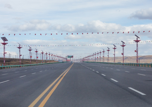 Empty road leading to Sogzong, Qinghai province, Sogzong, China