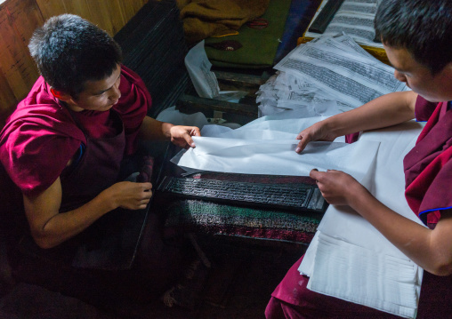 Tibetan scriptures printed from wooden blocks in the monastery traditional printing temple, Gansu province, Labrang, China