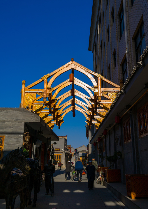 Wooden archway in the renovated old chinese quarter, Gansu province, Linxia, China