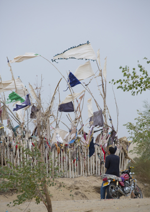 Uyghur Man Going To Pray At Imam Asim Tomb In The Taklamakan Desert, Xinjiang Uyghur Autonomous Region, China