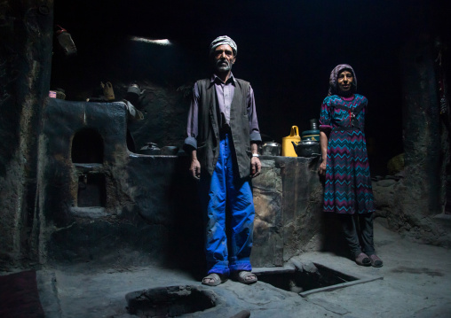 Afghan couple inside their traditional pamiri house, Badakhshan province, Qazi deh, Afghanistan