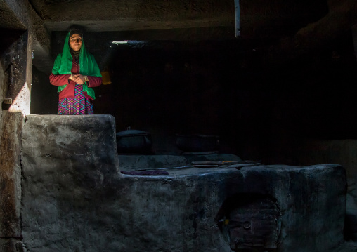Afghan woman inside her traditional pamiri house, Badakhshan province, Zebak, Afghanistan