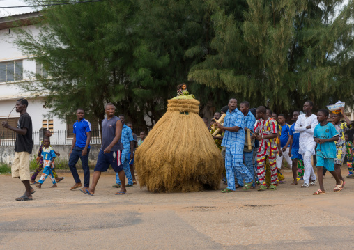 Benin, West Africa, Porto-Novo, zangbeto guardian of the night spirit going out in the street