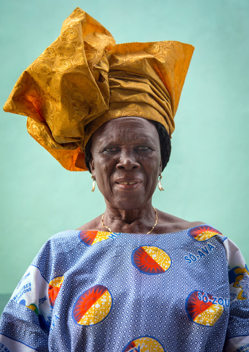 Benin, West Africa, Ganvié, fashionable old woman in traditional beninese clothing